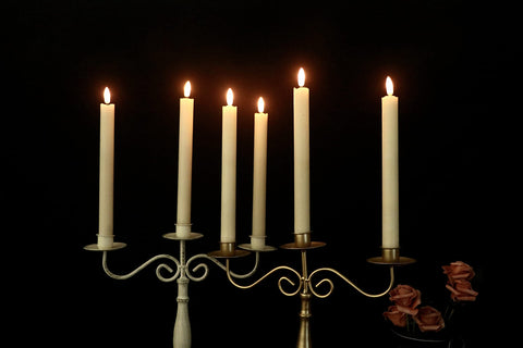 GenSwin ivory taper candle close-up shows realistic 3D wick flicker.