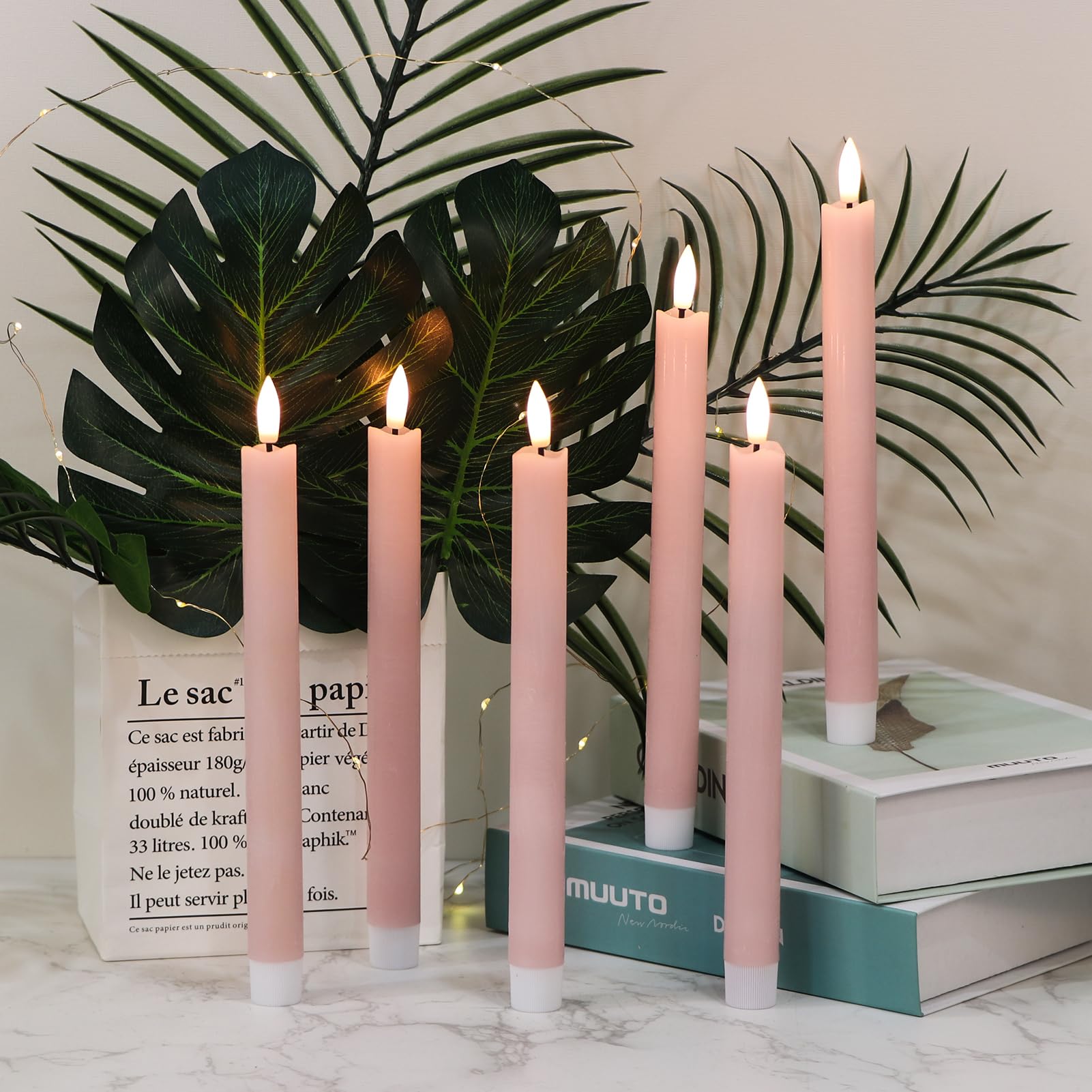 GenSwin real-wax taper candles provide a warm, natural look.