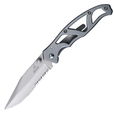 Gerber Paraframe clip-point blade close-up showing precise cuts in tight spaces.
