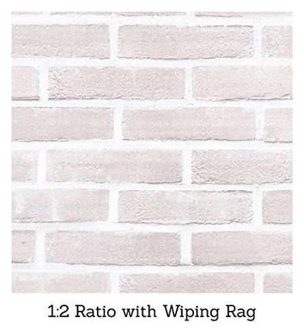 Applying Giani Brick Transformations whitewash with a brush to brick fireplace for a softer look.