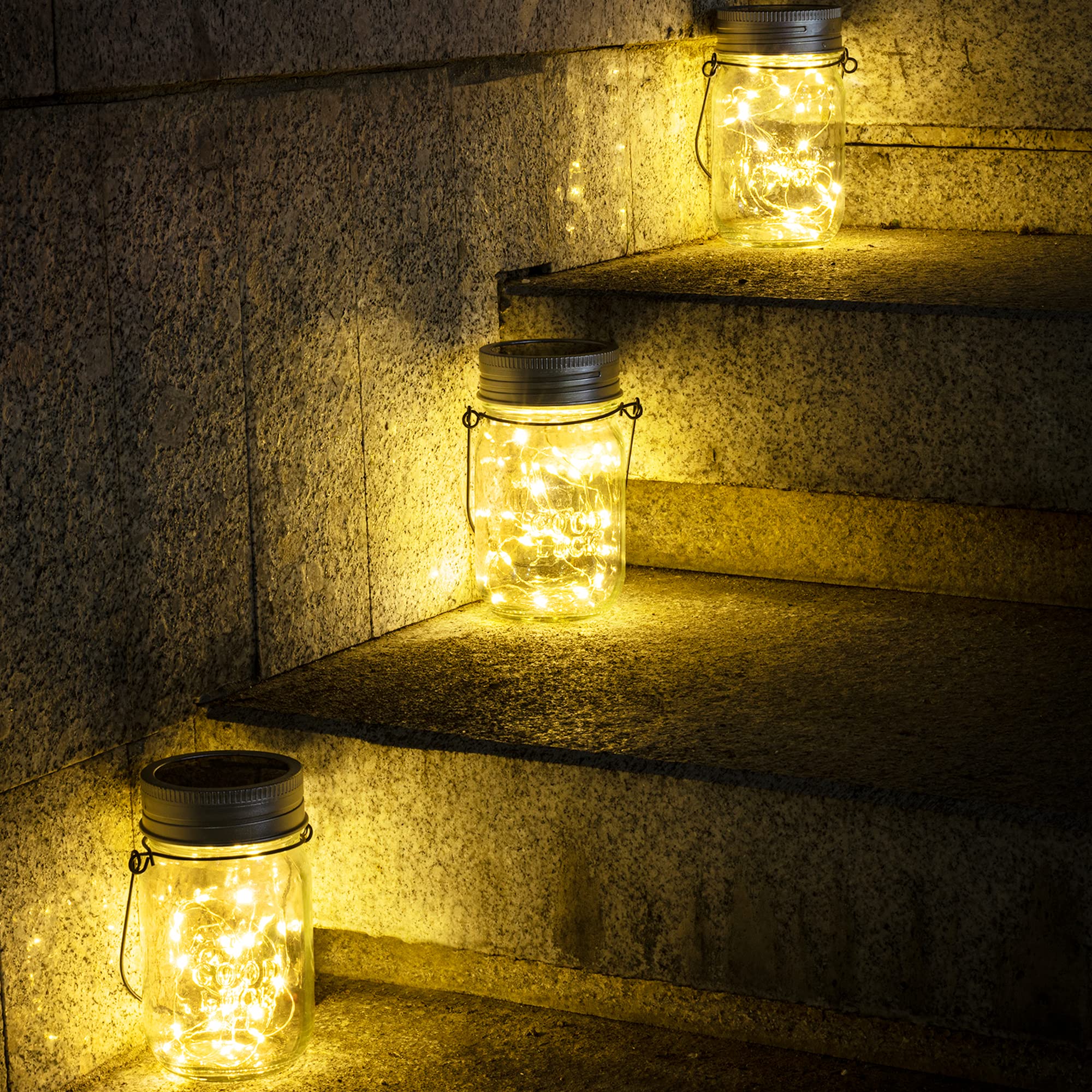 GIGALUMI lanterns on a patio table for intimate evening lighting