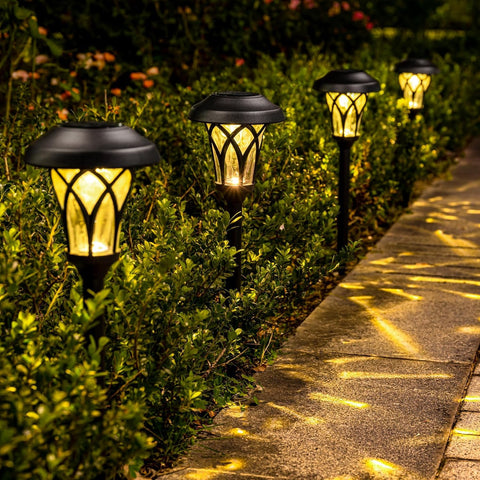 GIGALUMI warm white illumination enhances walkways and patios.