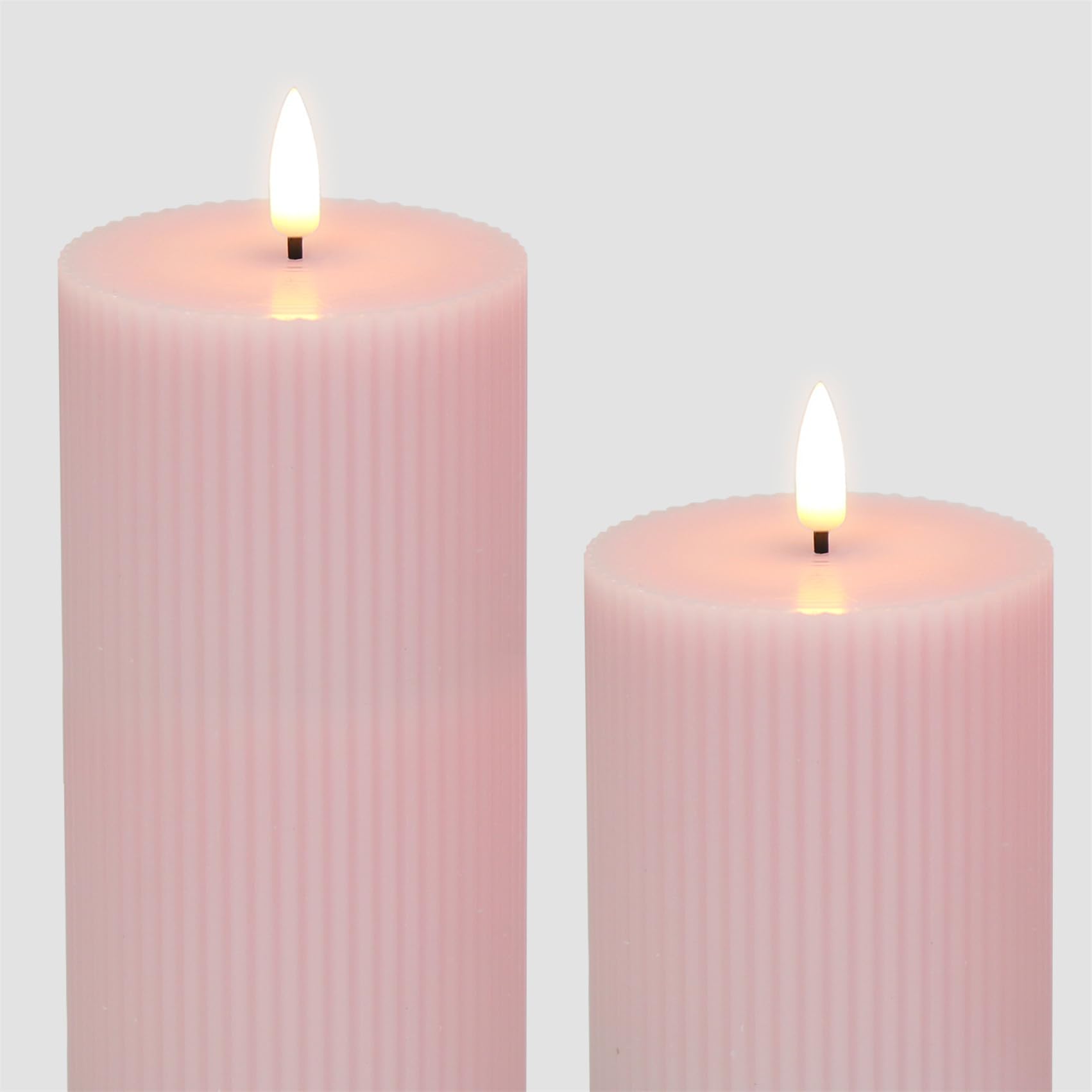 Girimax pink candles are an elegant gift option for weddings and holidays.