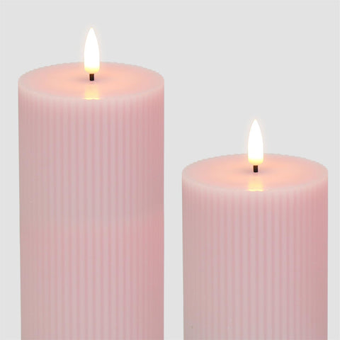 Girimax pink candles are an elegant gift option for weddings and holidays.