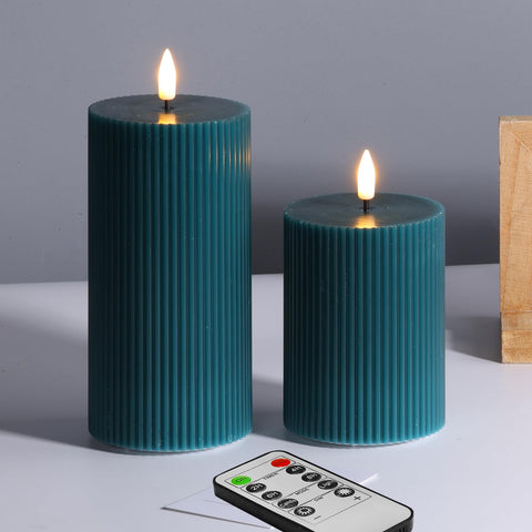 Girimax green ribbed LED pillar candle 3x4 showing a warm, inviting glow for intimate spaces.