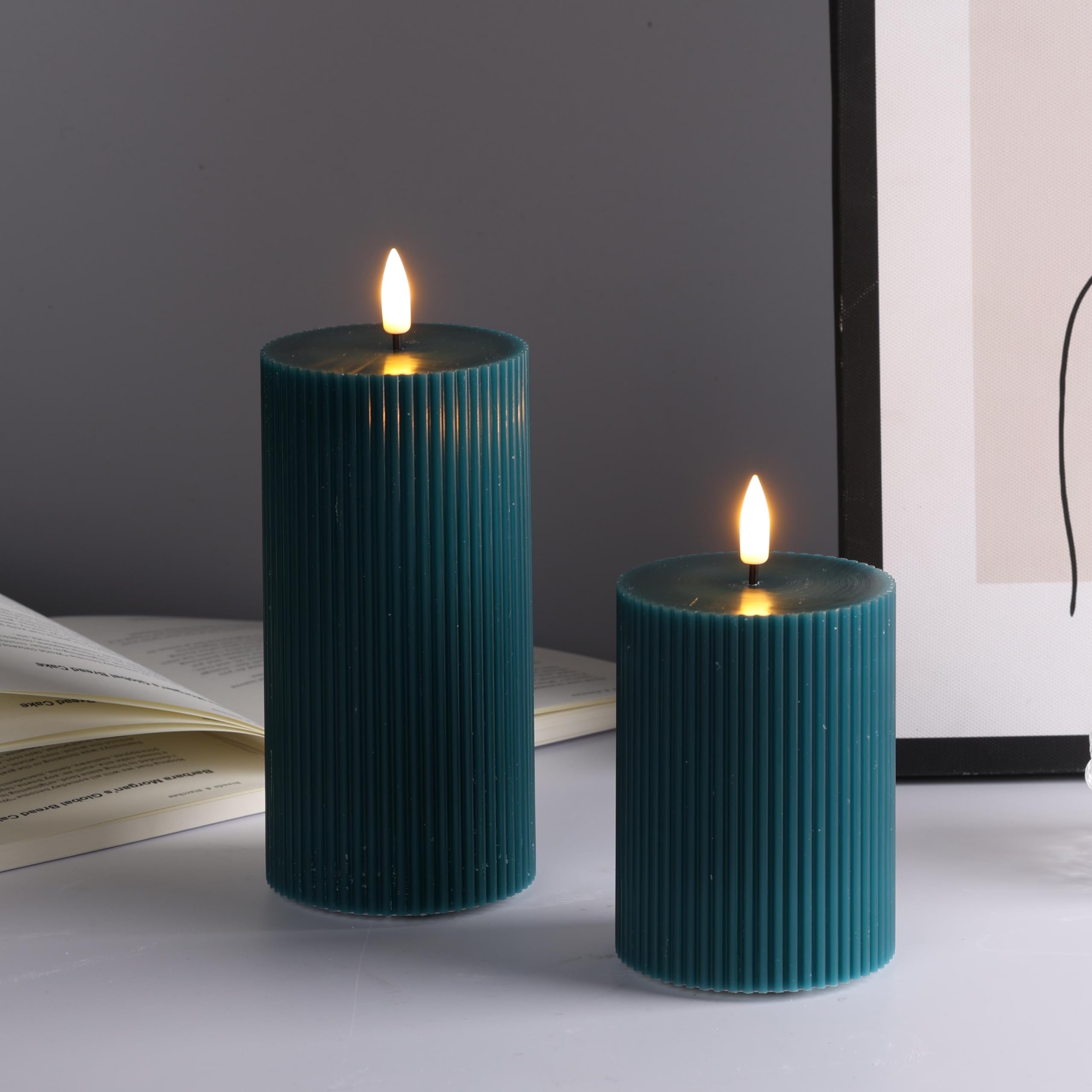 Girimax packaging box reveals two candles with remote and user manual.