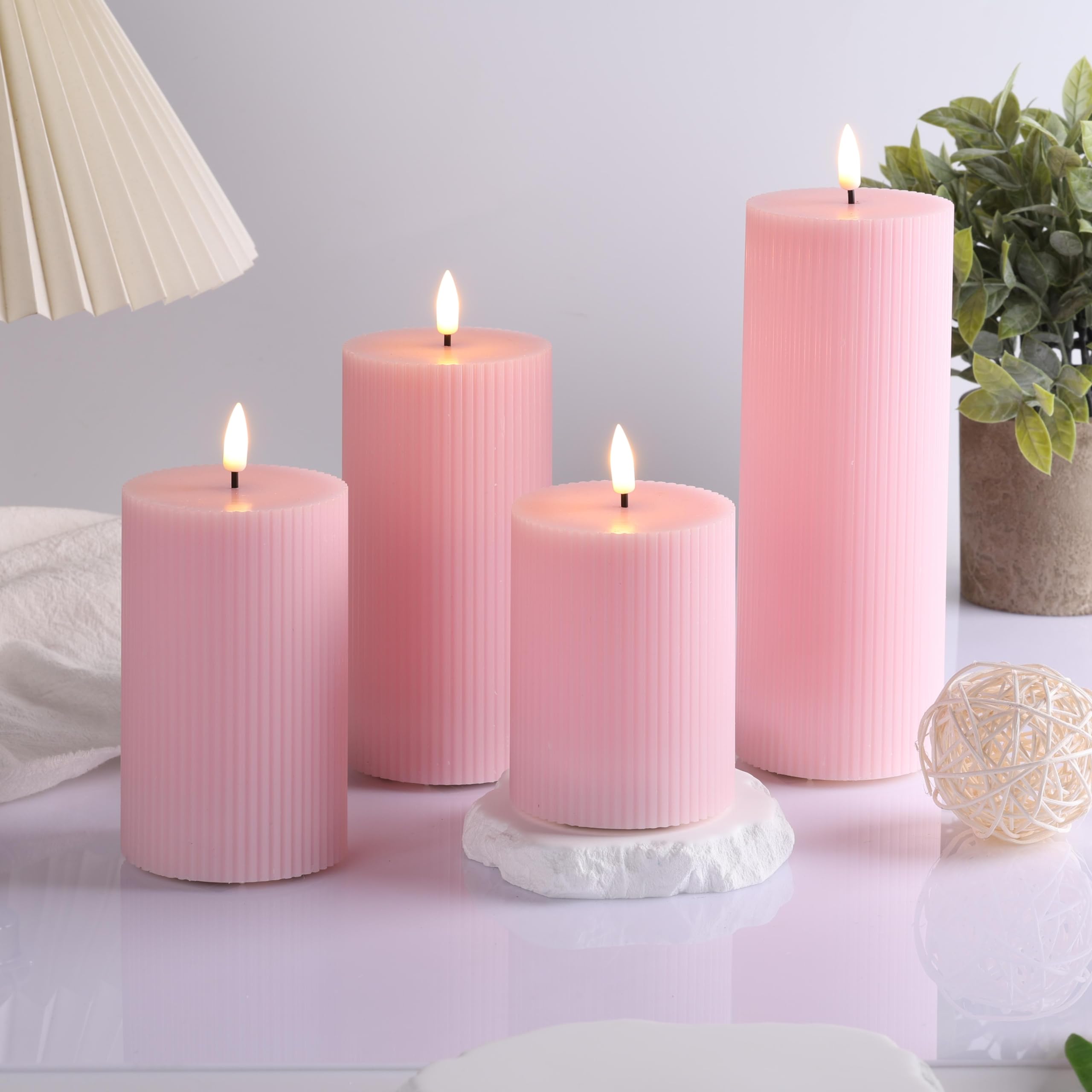 Girimax pink ribbed LED pillar candle 3x8 offers dramatic vertical lighting.