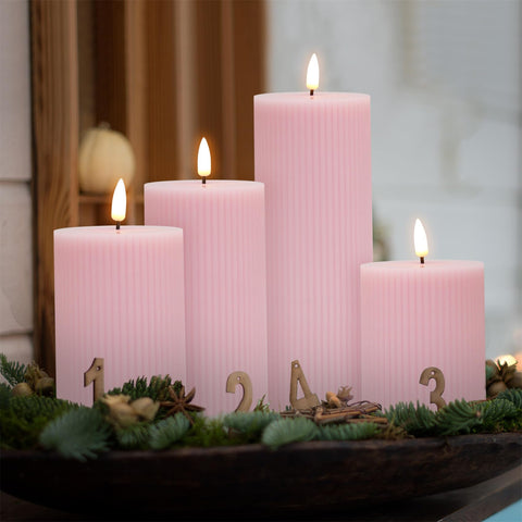 Girimax pink ribbed LED pillar candle packaging image for gift-ready presentation.