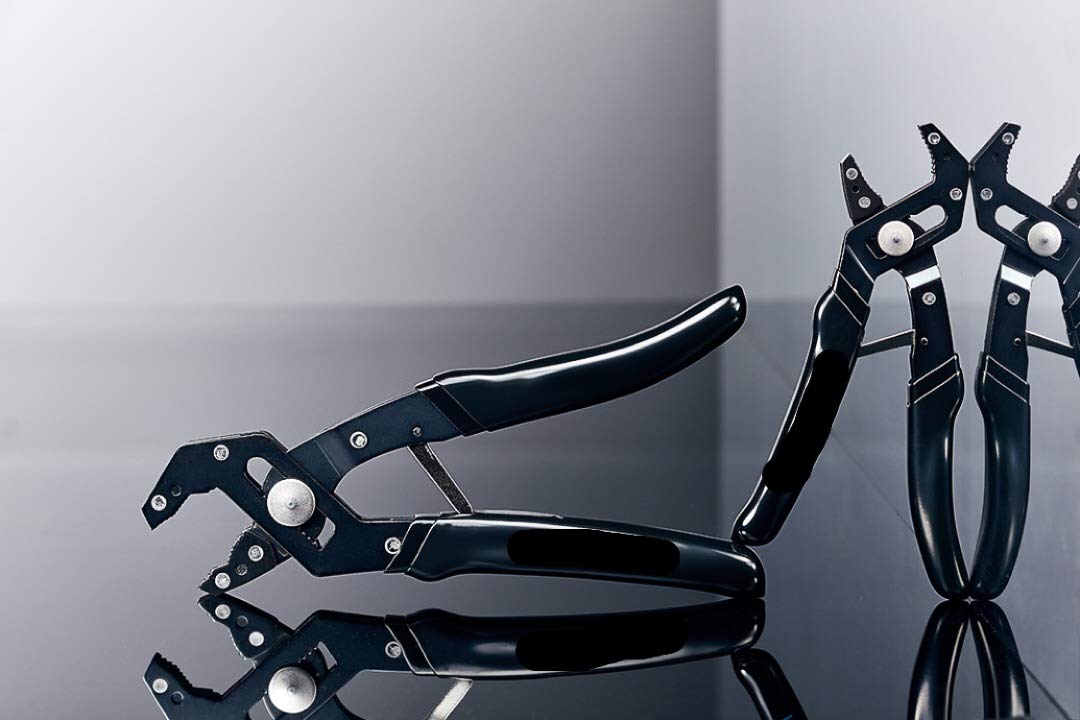 Glitter Sun Robo-Style V-notch pliers showing adjustable jaws for versatile grabbing.
