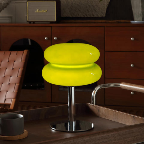 Glivpny mushroom lamp in the bedroom provides warm ambient light for reading.