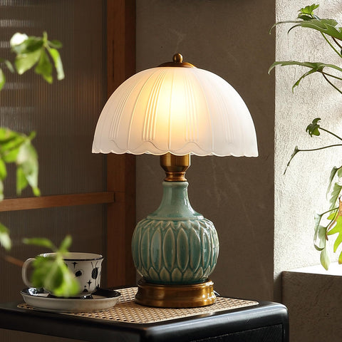 Glivpny vintage lamp with green base adds timeless style to your living room.
