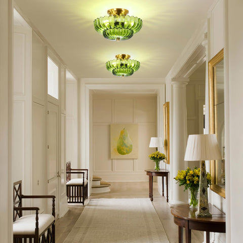 GloMuse vintage brass base with green shade highlights entryways with stylish illumination.