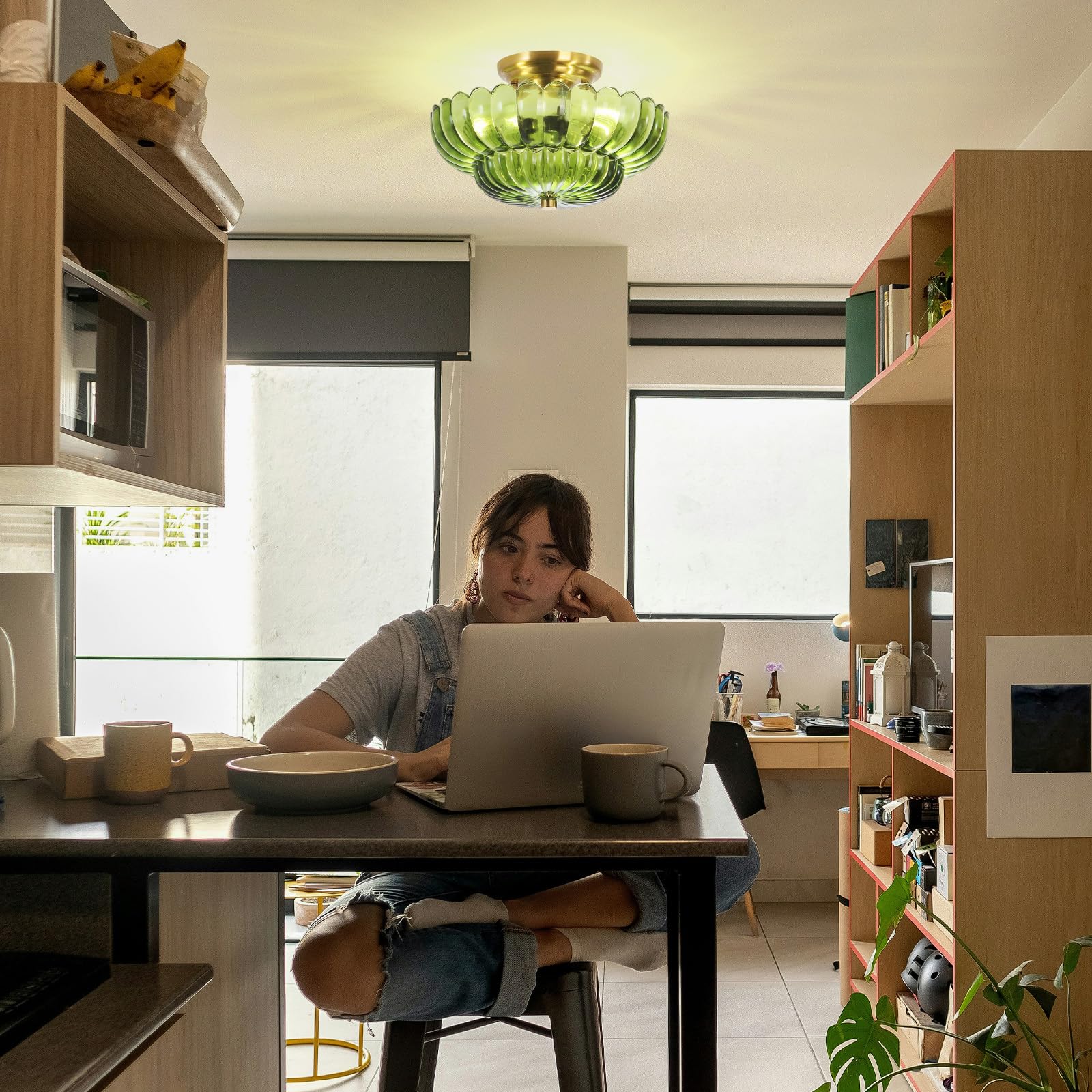 GloMuse green shade 3-light fixture brightens kitchens and dining areas with mid-century vibes.