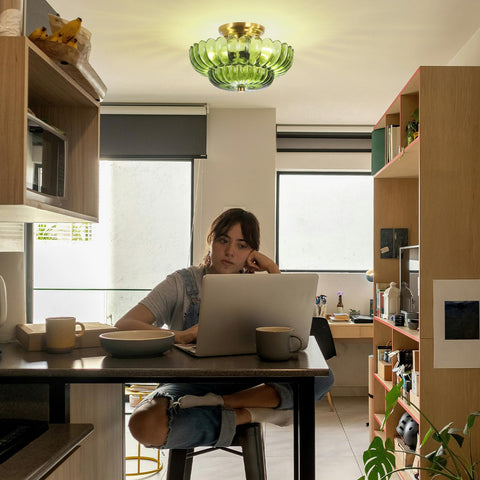 GloMuse green shade 3-light fixture brightens kitchens and dining areas with mid-century vibes.