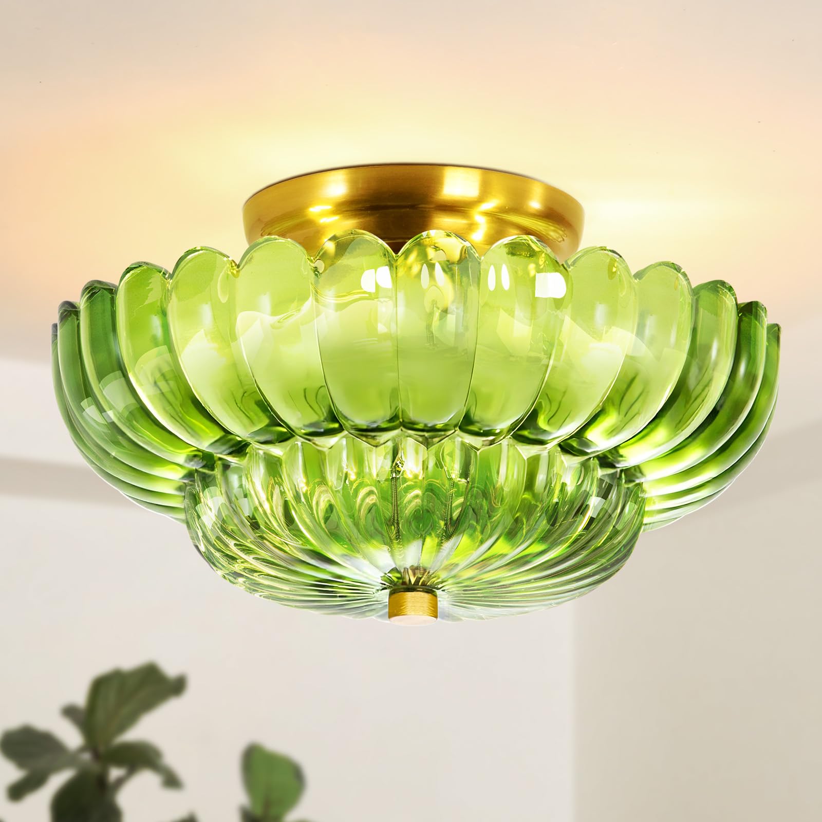 GloMuse semi-flush green glass dome with brass base provides warm ambient light for living spaces.