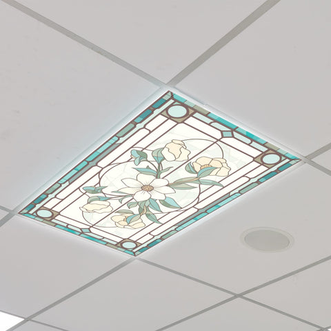 Glooglitter stained-glass pattern casts warm, decorative light across walls.