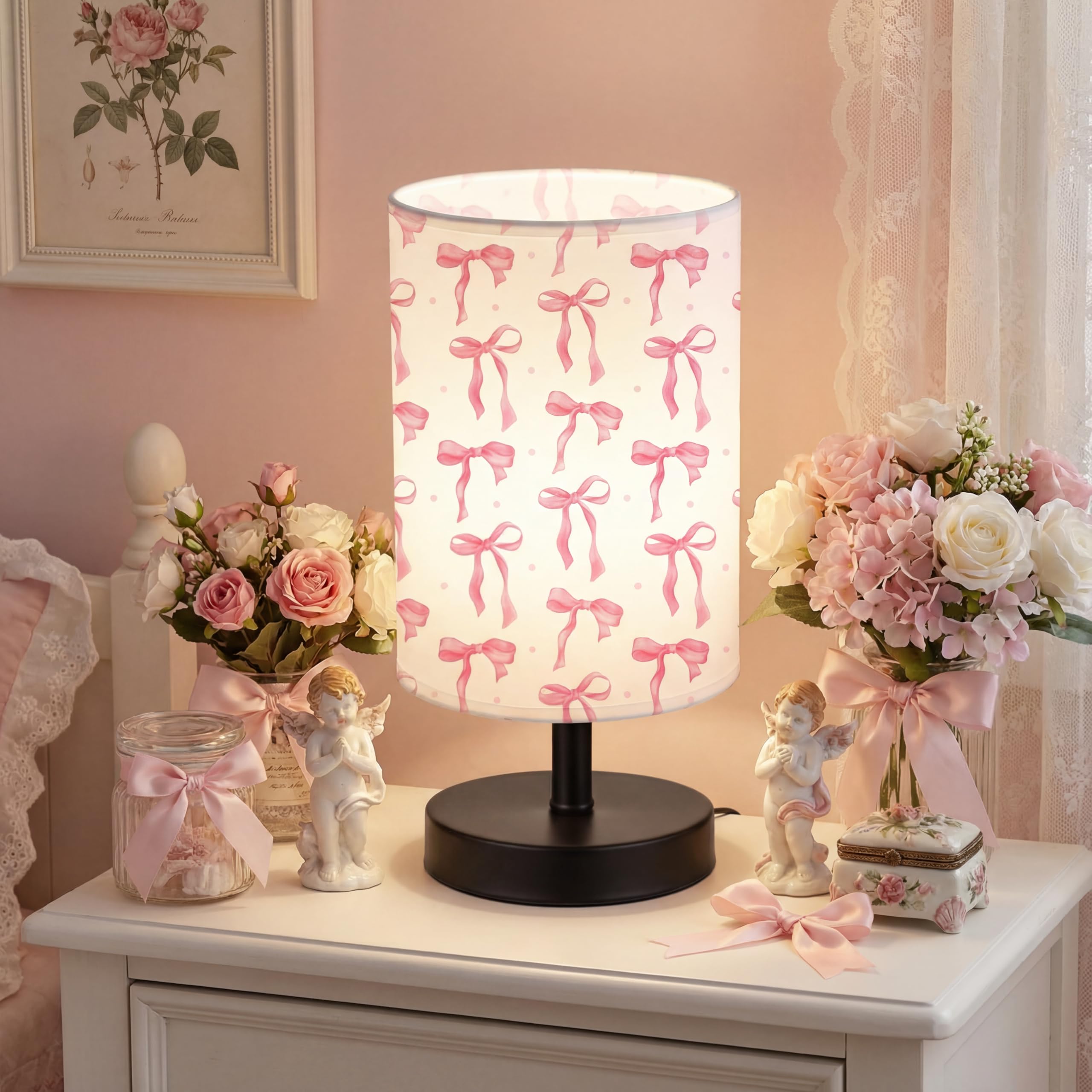 Glooglitter pink bow table lamp adds playful charm to a bedside or desk