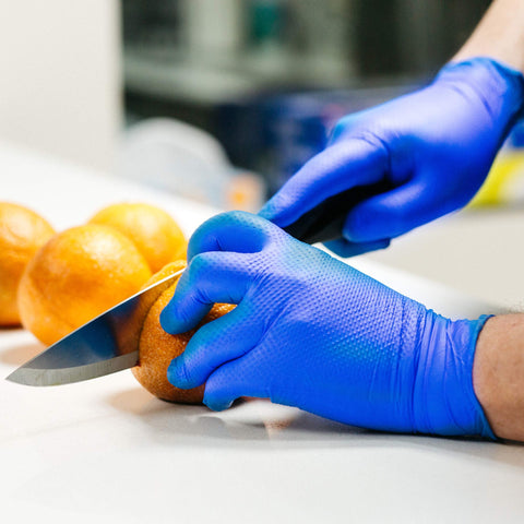GLOVEWORKS HD blue nitrile gloves resist grease and petroleum-based chemicals.