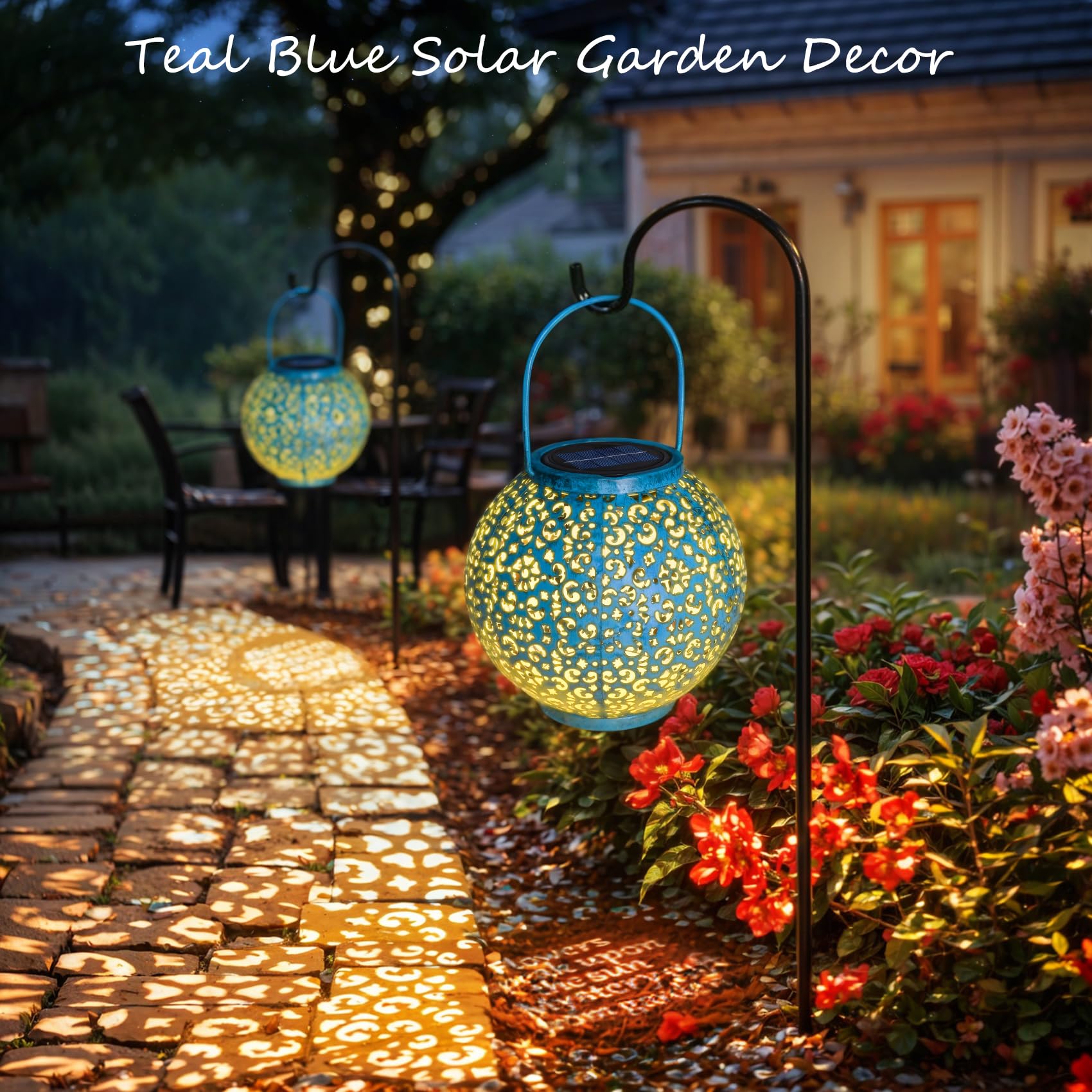 Go2garden teal lantern decorates garden path with vivid floral pattern.