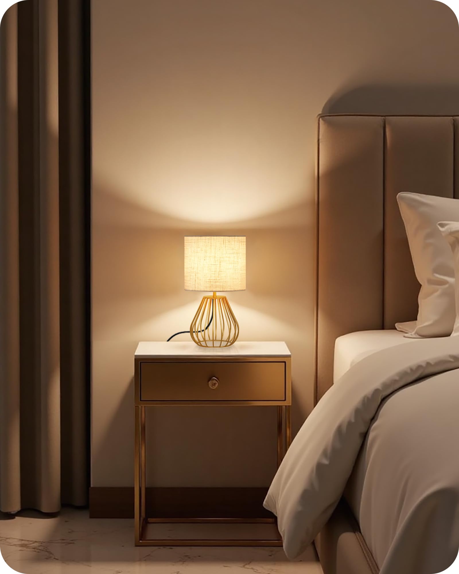 GOEBLESON Gold Table Lamp beige lampshade creates soft, warm lighting for reading.
