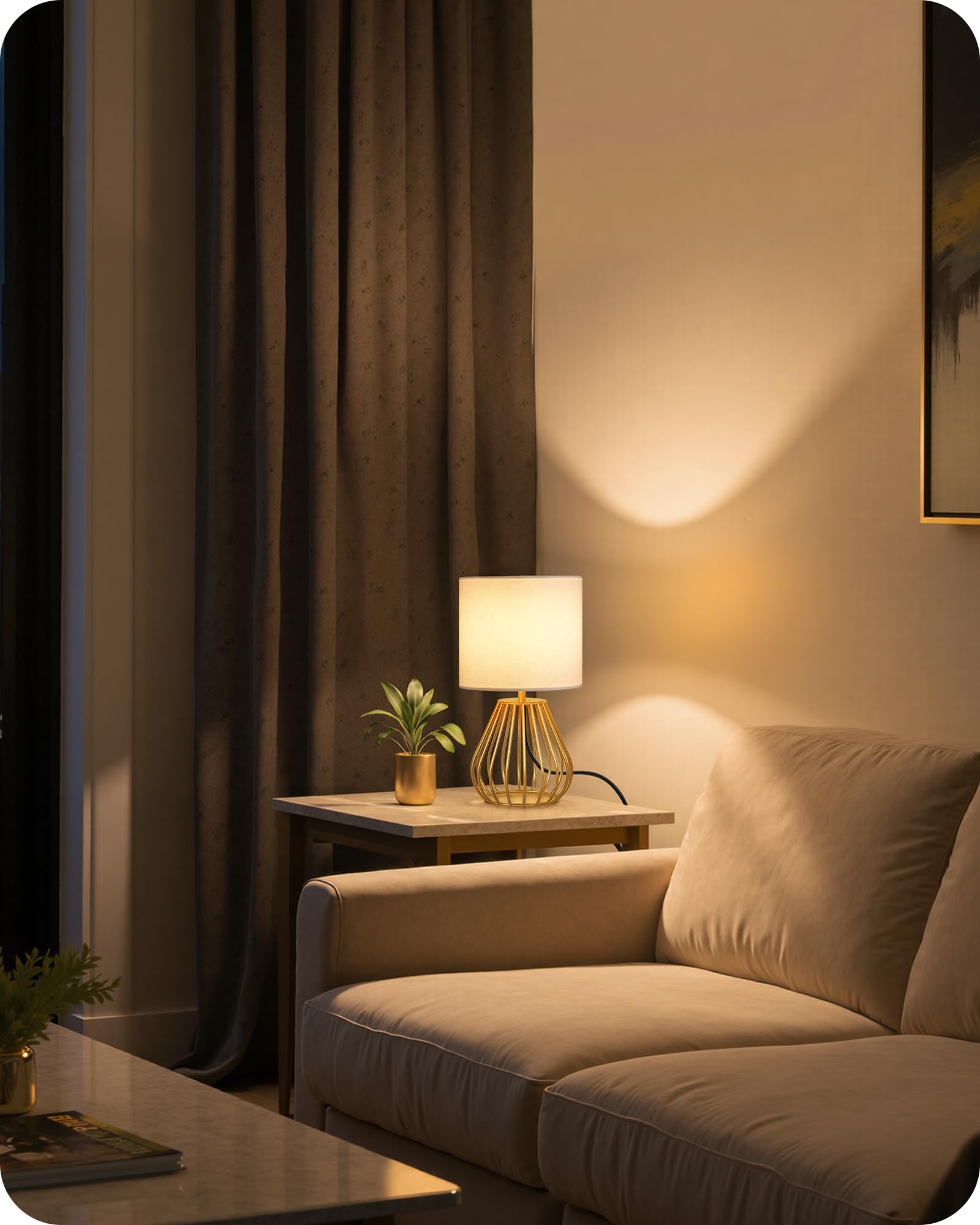 GOEBLESON gold table lamp enhances living room ambience