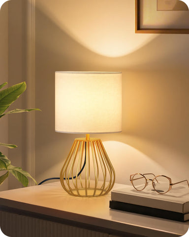 GOEBLESON gold table lamp with teardrop base for stable bedside lighting