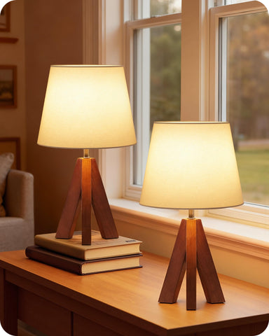 GOEBLESON small tripod lamp with dark-wood-base adds warm ambiance.