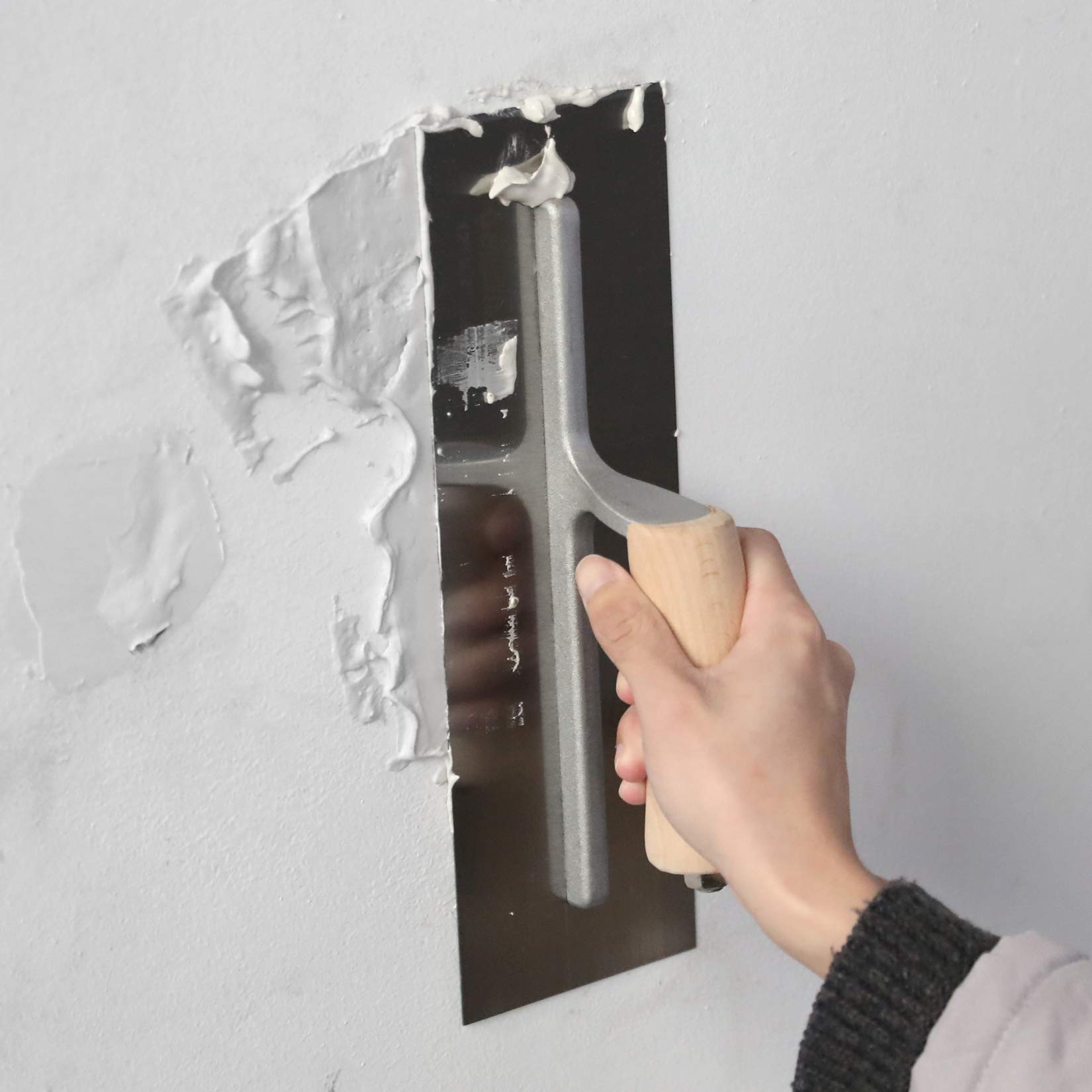 Beveled edges on Goldblatt trowel prevent popping of aggregates