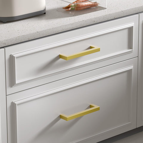Goldenwarm brushed brass cabinet hardware enhances cabinet fronts.