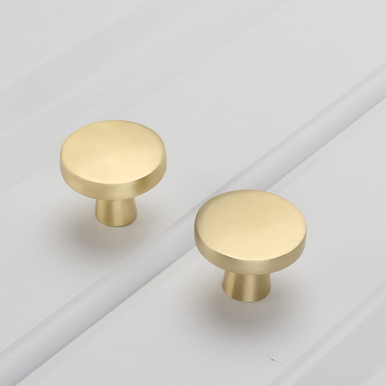 Goldenwarm knob installed on a dresser drawer for easy use.
