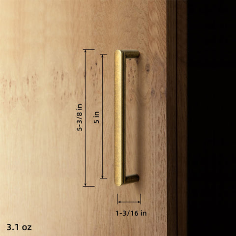Goo-Ki antique brass cabinet pull with non-slip grip enhances handling and style.