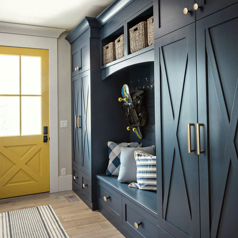 Goo-Ki antique brass wardrobe pull adds timeless detail and smooth operation.