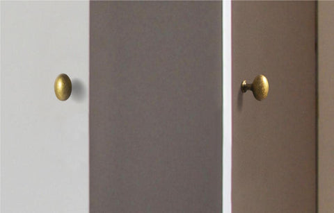 Goo-Ki antique brass knob with easy installation on dresser doors