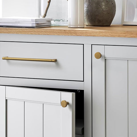Goo-Ki drawer knob with screws demonstrates easy installation.