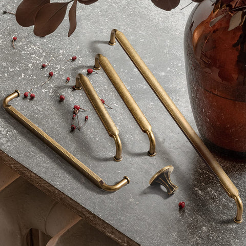 Goo-Ki solid zinc alloy drawer pulls in antique brass boost furniture durability.