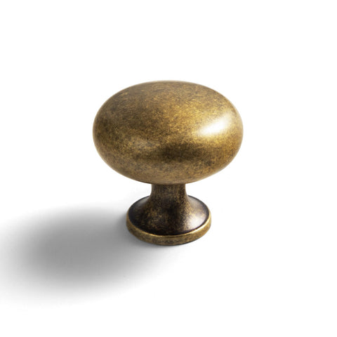 Goo-Ki vintage brass cabinet knob with center hole for easy installation.