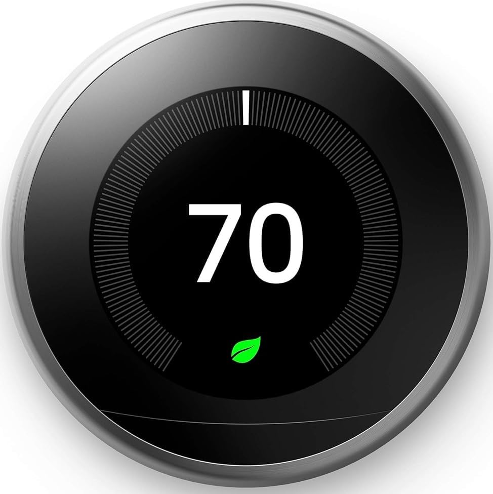 Google Nest Learning Thermostat display on wall showing a bright temperature readout