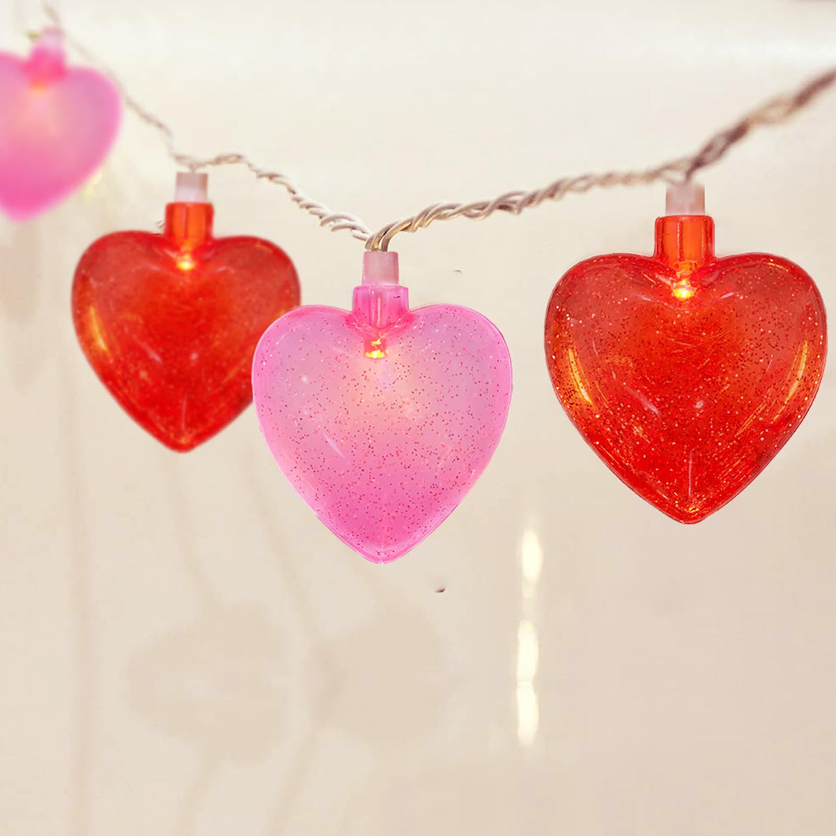 GOOTHY Heart String Lights with pink glitter hearts for romantic indoor ambiance