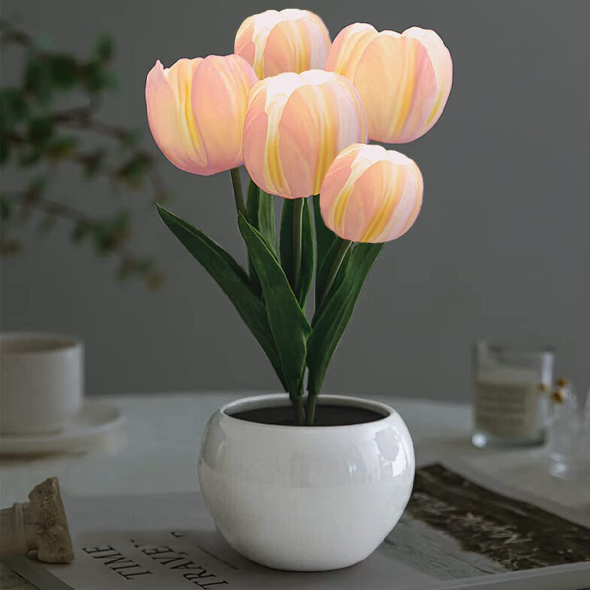 GOUTOOL tulip lamp in pink bloom provides cozy desk lighting.