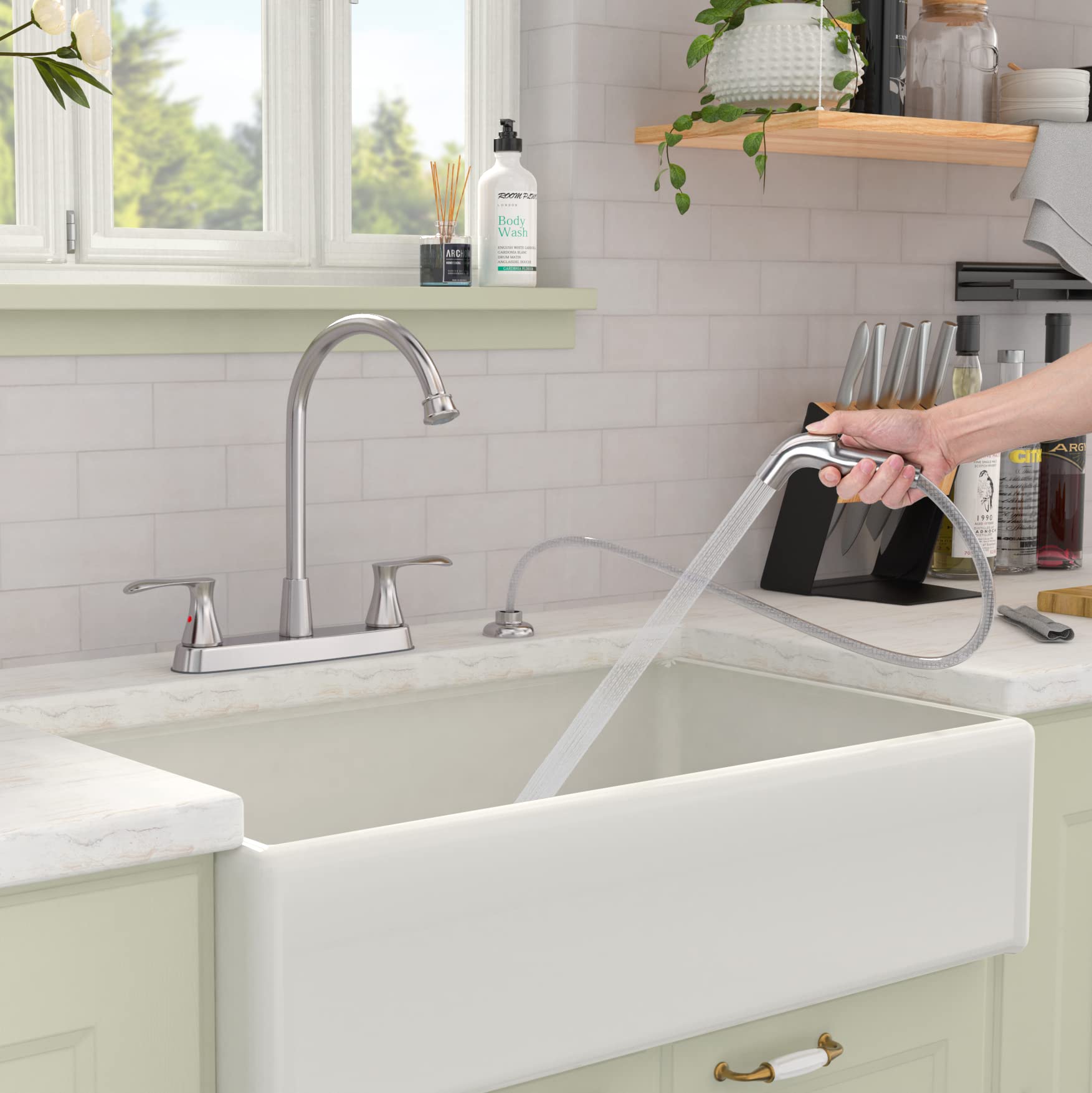 GOWIN brushed nickel faucet packaging includes faucet and sprayer components.