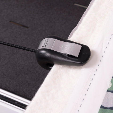 Grace Bungee Clamps clipping over fabric with minimal bulk.
