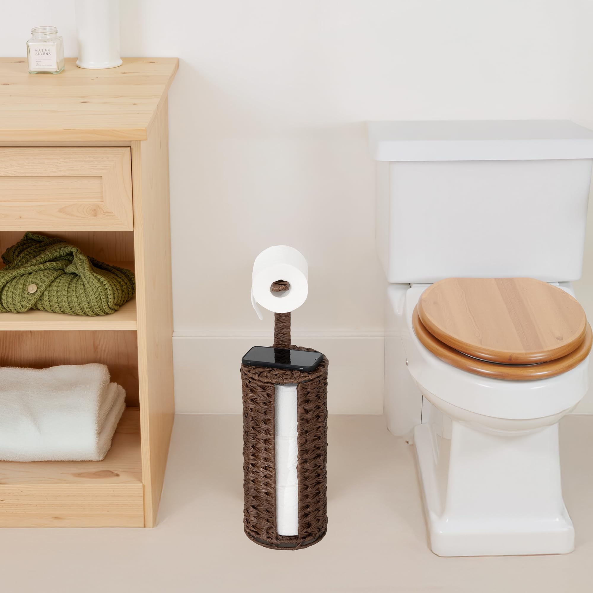 GRANNY SAYS warm brown wicker toilet paper holder styling in bathroom