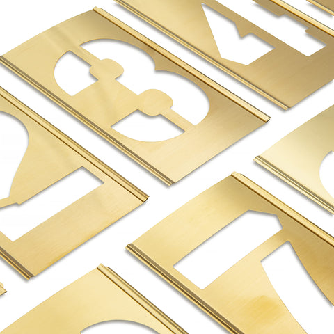 Grayspiral brass interlocking numbers 0-9 for precise curb lettering.