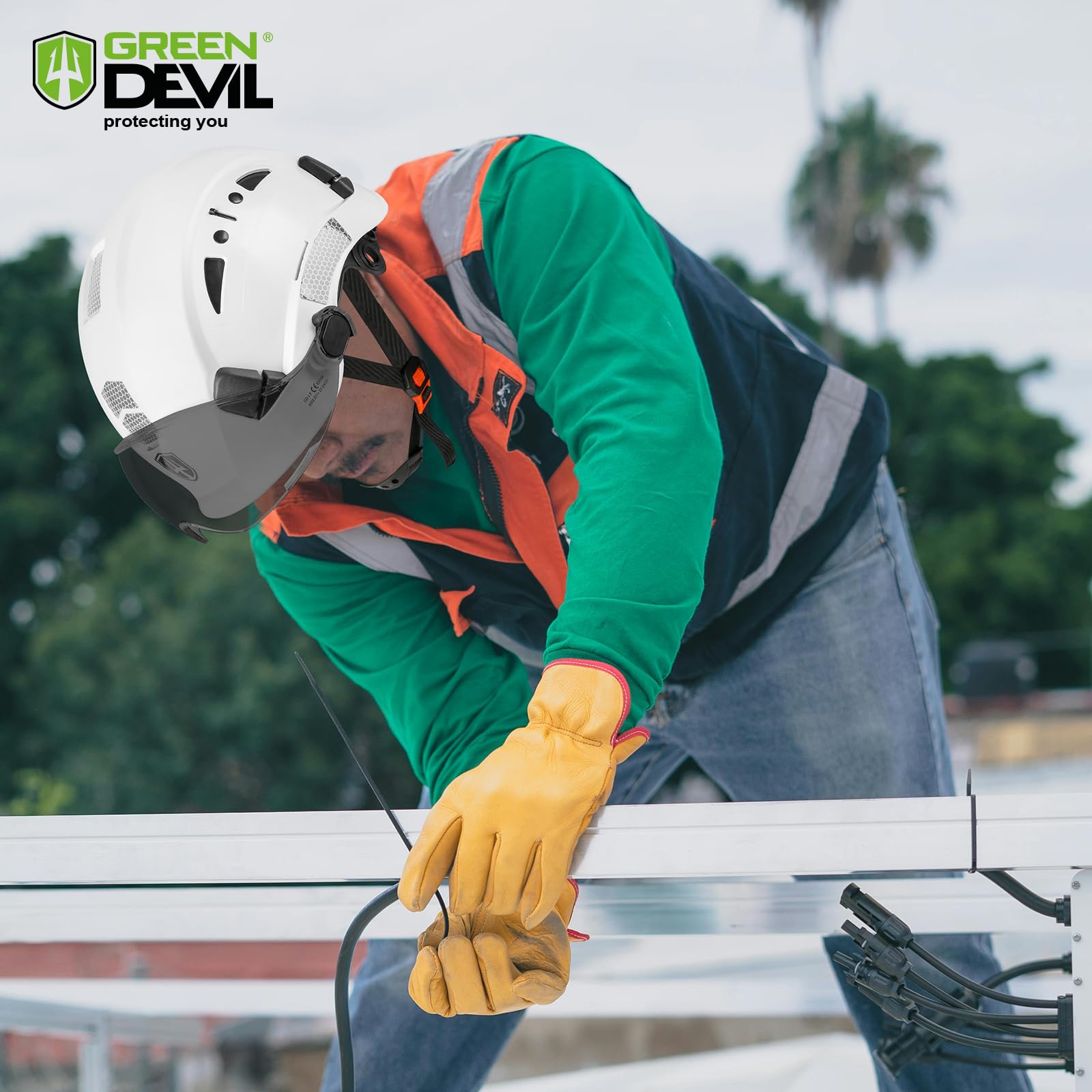 Green Devil safety hard hat features hi-viz stickers for better visibility.