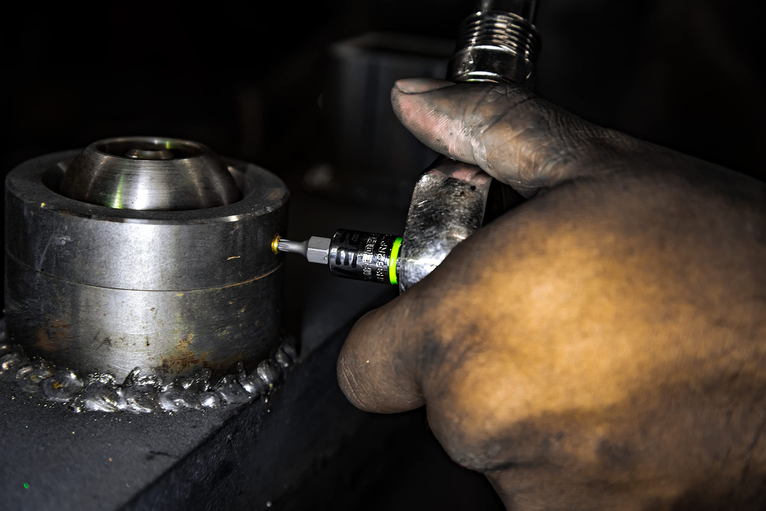 Grip Edge tool-in-use automotive repair demonstrates practical versatility