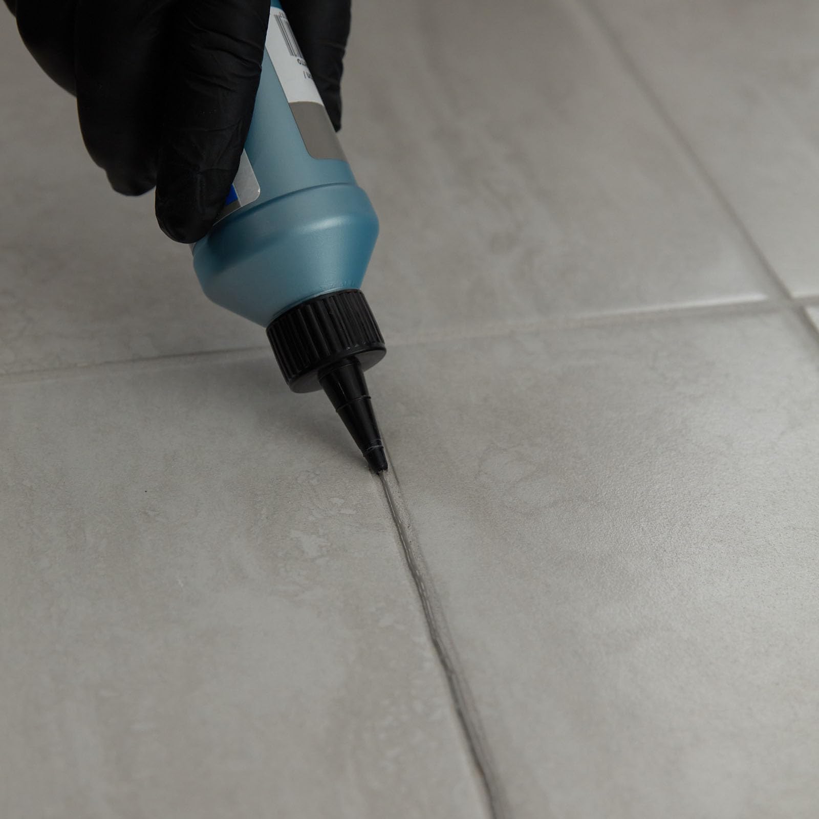 Grout colorant applicator tip for precise color application.
