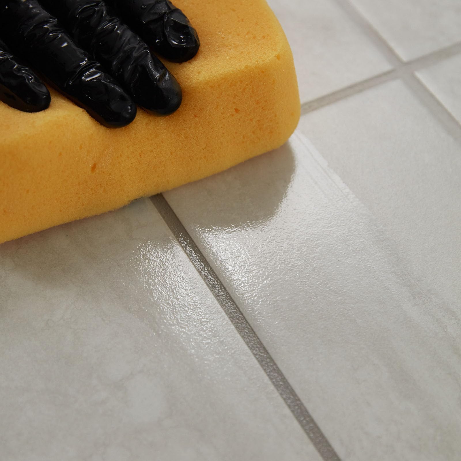 Grout sealing close-up showing moisture protection.