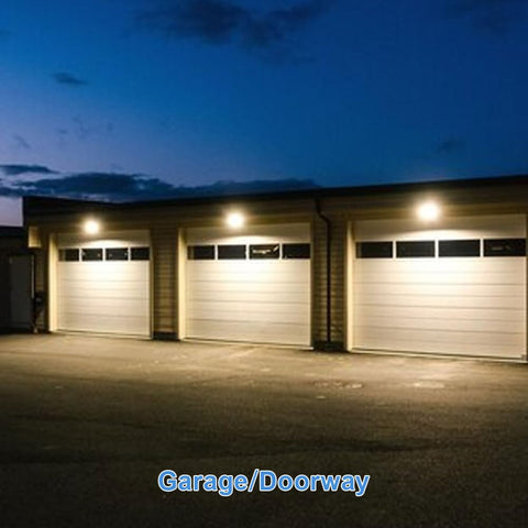 GRUOTVSZAK MP100/U/MED outdoor lighting in driveway setting illustrating wide coverage.