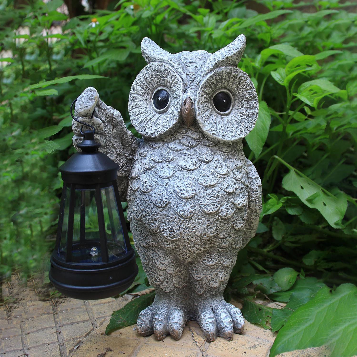 GUANFU weather-resistant owl statue illuminates paths with a warm LED glow.