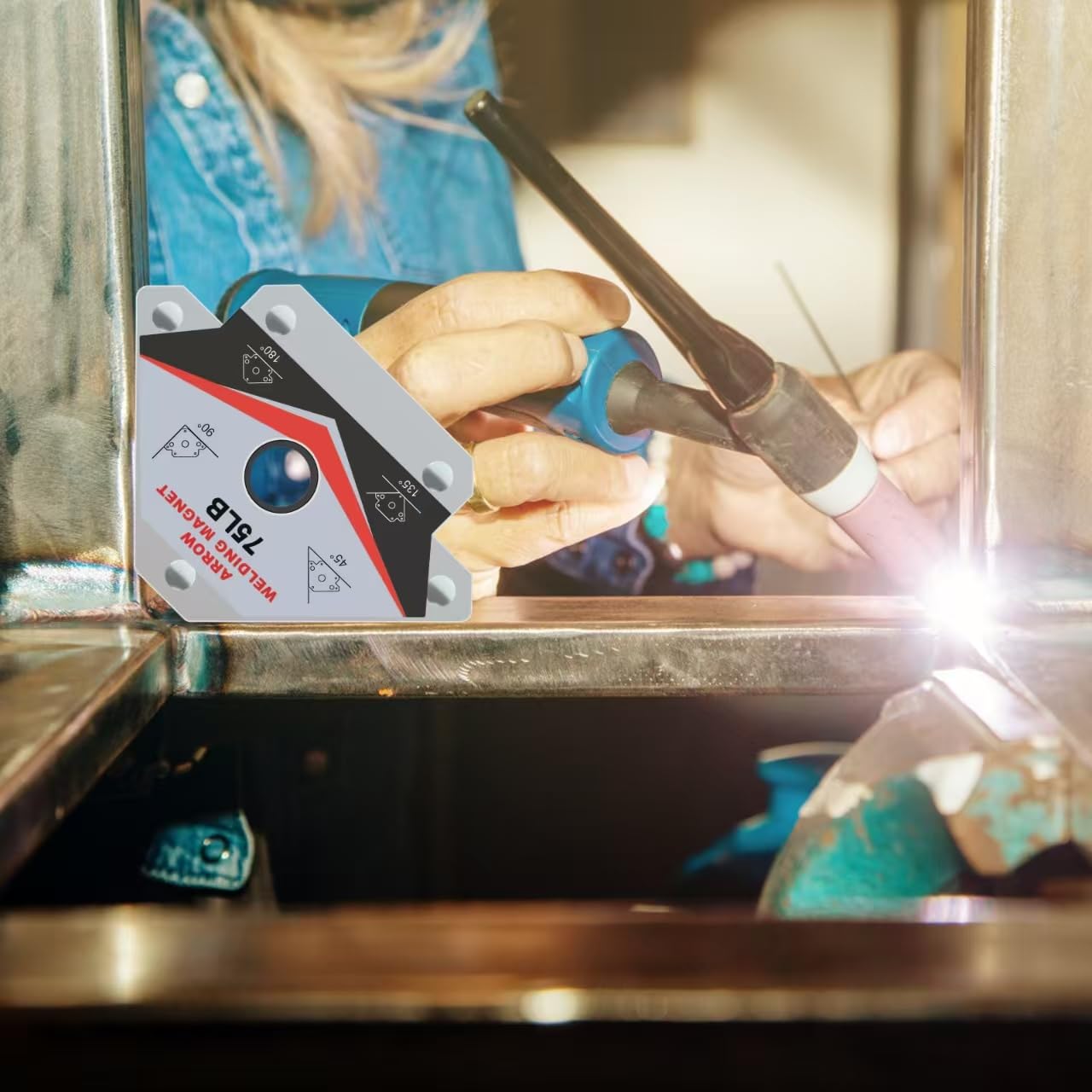 Guti-More welding magnet arrow at 90-degree angle enabling precise fixture.